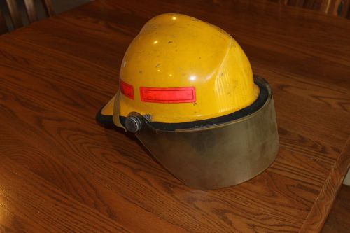 Used morning pride‘s ‘72 plus yellow fire helmet for sale
