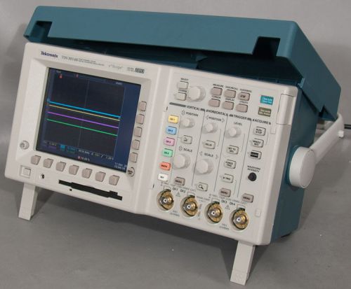 Tektronix tds3014b 100 mhz digital phospor oscilloscope w/batt/comm/limit/analys for sale