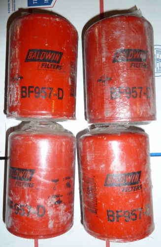4 x baldwin filters bf957-d fuel filter, 5-7/16 x 3-11/16 x 5-7/16 in four for sale
