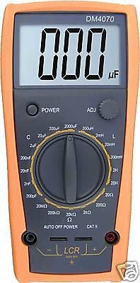 DM4070 LCR meter capacitance 2000uF compared w/ FLUKE self-discharge tester USA