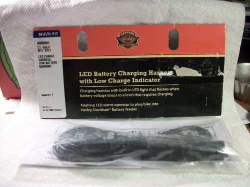 LED BATTERY CHARGING HARNESS WITH LOW CHARGE INDICATOR