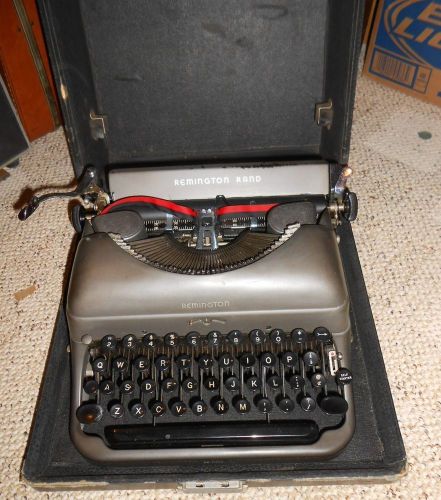 vintage Remington Rand  typewriter in case, nice DeLuxe?