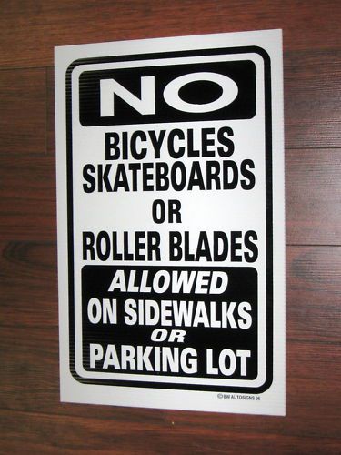 General Business Sign: No Bicycles or Skateboards or...