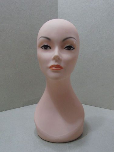 Female mannequin head with mounting hole on the bottom for wigs, hats or scarfs