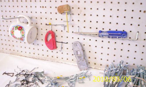 PEGBOARD HOLDERS-LOTS OF THEM-CHEAP !!!