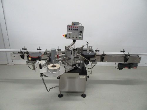 CLI WRAP AROUND LABELER FOR ROUND BOTTLES MODEL UNI-310 WITH CODER