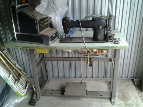 Industrial sewing machine with table