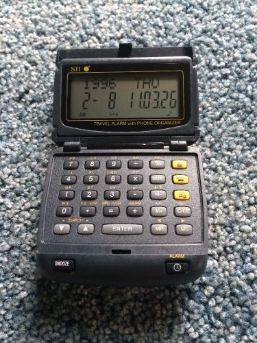 Seiko SII Travel Alarm Clock With Phone Organizer And Calculator