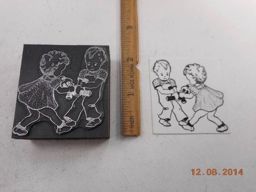 Letterpress Printing Printers Block, Toddlers fight over Teddy Bear Toy
