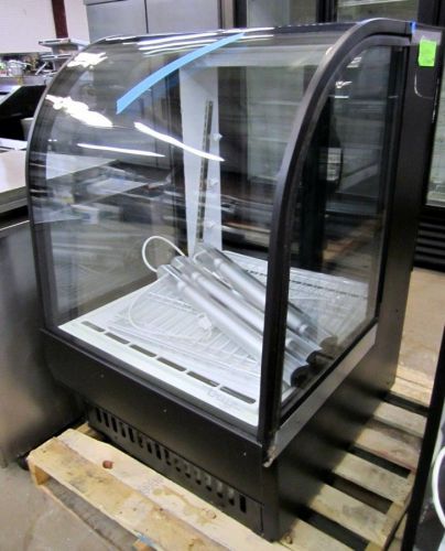 True tcgr-31 refrigerated curved glass bakery display case for sale