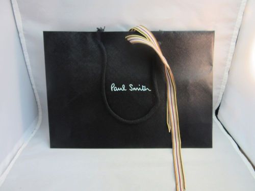 Paper gift, shopping bag from Paul Smith designer store. Black and white logo