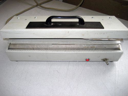Used vintage heal sealing machine, model ml-14, 375w, works great, w/warranty for sale