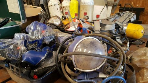 Lot of air tanks, masks, and cannisters