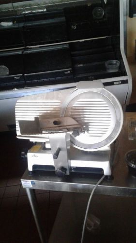 Univex meat slicer.  In very good condition and it works!