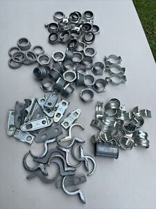 Lot of 92  1-1/2” conduit fitting, grounding bushing, chase nipple, strap &amp;Back