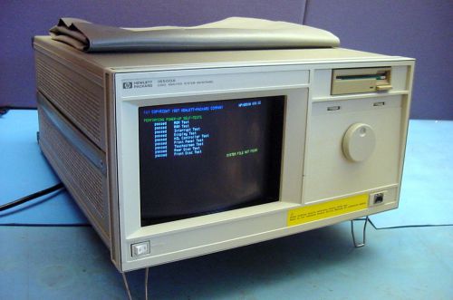 WORKING HP 16500A LOGIC ANALYSIS SYSTEM MAINFRAME W/MINI SYSTEM DISKS, MANUAL
