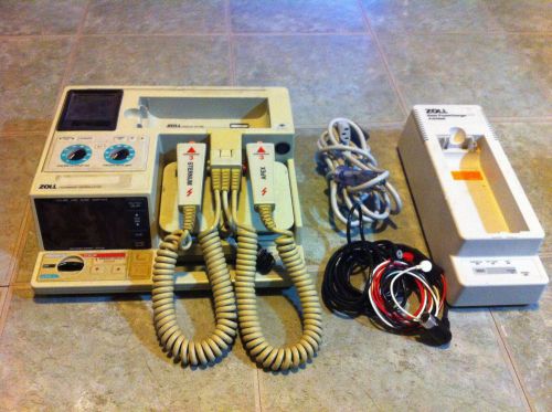 Zoll defibulator / ekg with battery charging station. for sale