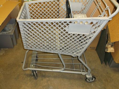 Small gray plastic shopping cart used, in excellent condition all gray for sale
