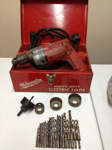 Milwaukee Magnum 1/2&#034; Drill w/cord, Drill bits, hole saw cutters,+ carrying box.