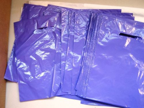80 purple plastic bags with die cut handle 9 x 12 for sale