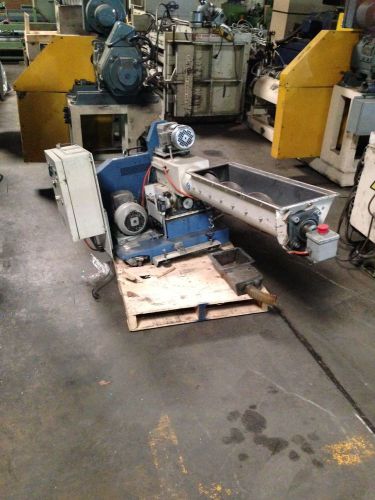 Auger feed granulator by tria type 22-20/bl-c in operating condition for sale