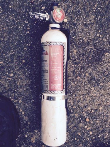 Marine heat sensitive fire extinguisher and mounting bracket