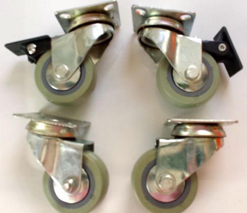 Set of (4) swivel casters, new, 2 inch, (2) with brakes for sale