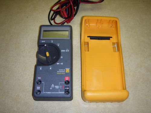 FLUKE 77  MULTIMETER WITH LEADS AND CASE.