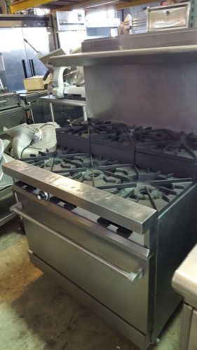 USED V-SERIES VULCAN 6 BURNER WITH A STEP UP GAS RANGE