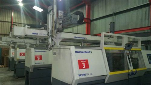 (7) battenfeld ba1000/200 cdk- se injection molding machines with robots for sale