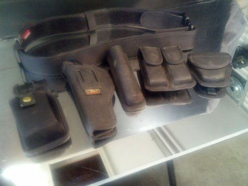 Lot of bianchi black tactcal le belt &amp; accesories includes uncle mikes holster for sale