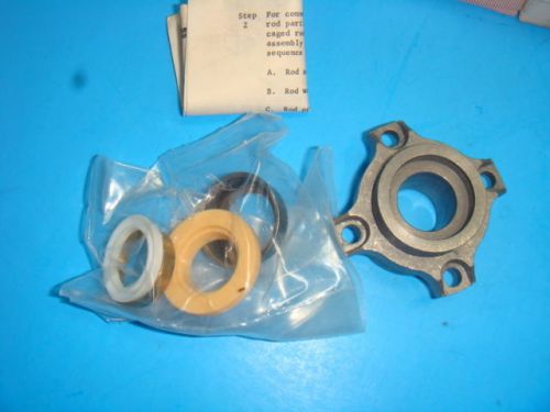 1 NEW MILLER HYDRAULIC CYLINDER PISTON ROD SEAL AND BOLTED BUSHING, 051-KR015-63