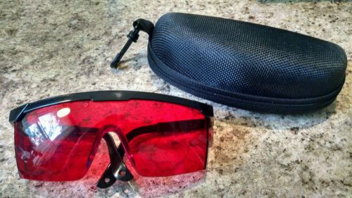 Red safety glasses for green , blue, and uv lasers that can burn. for indoor use for sale