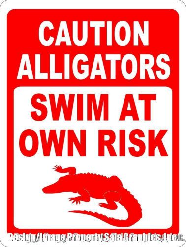 Caution Alligators Swim at Own Risk Sign .Post where danger of gators is present