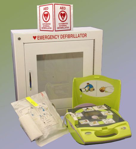 Zoll aed plus aed with carrying case &amp; wall mounted alarmed aed cabinet &amp; sign for sale