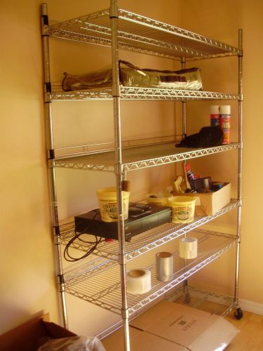 DECORATIVE WIRE CHROME FINISH SHELVING.