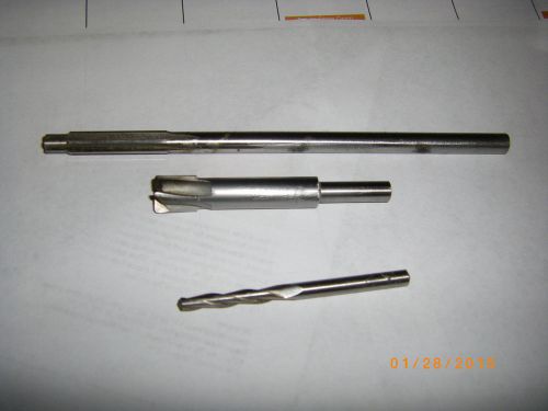 Machinist tools, 2 reamers and a tapered bit.