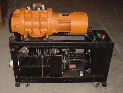 Alcatel 2063c vacuum pump and alcatel rsv 601 r blower package unit for sale