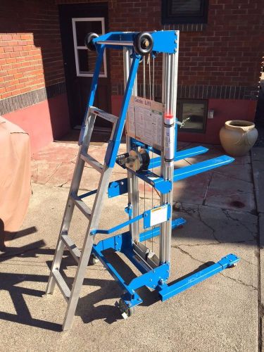 ++++ GENIE GL-8 LIFT WITH LADDER, 4 POINT CASTER STRADDLE BASE