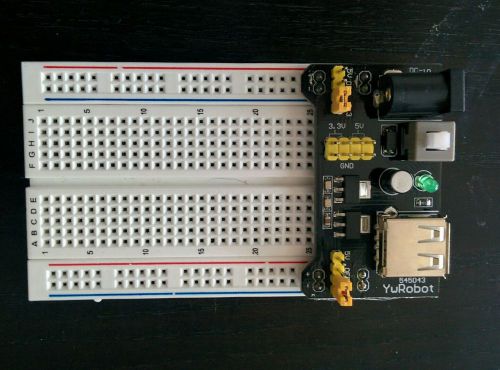Solderless breadboard, Power Supply and acrylic plate to fit an Arduino Uno
