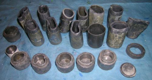 Assorted lead containers(pigs), bent, crooked,  sold as scrap for sale