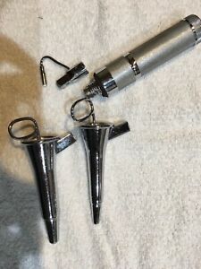 2 Welch Allyn autoclaveable anoscopes with rechargeable battery light source.
