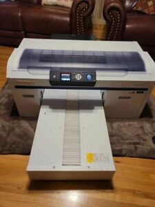 Epson SureColor SC-F2000 Direct to Garment Printer. Dark shirt or white capable.