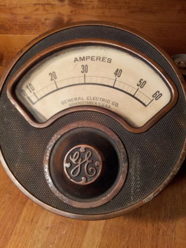 Antique GE Ammeter in large brass or copper housing.  7&#034; diameter - over 11 lbs