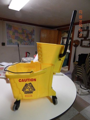 Rubbermaid bucket and wringer  model 7570  wringer yellow commercial combo for sale