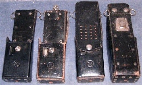 Four General Electric radio holsters