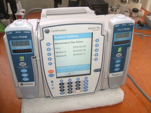 Alaris pcu 8015 iv pump controller w/ 2 8100 lvp module/drug library/excellent for sale