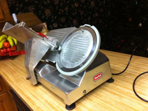 Berkel 827 a 12&#034; manual gravity feed meat slicer - 1/3 hp for sale