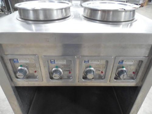 Stainless steel 4 well donut icing warmer table - measures 30&#034; x 36&#034; x 40&#034; for sale