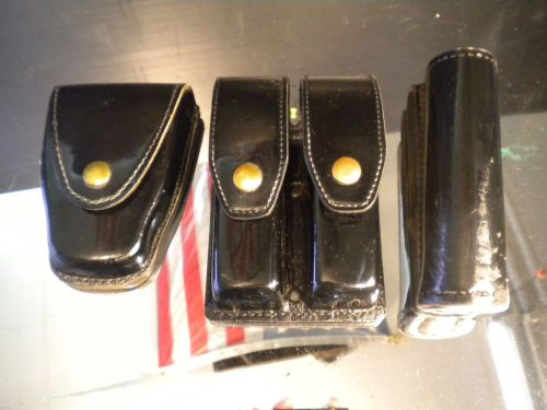 Lot of chloroform tex shoemaker a.e. nelson handcuff case pouch, magazine holder for sale